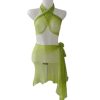 Scarf rajut sheer warna hijau limau (lime green), diikat sebagai halter neck crop top dan mini skirt asimetris.